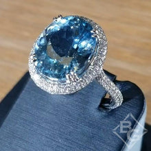 Load image into Gallery viewer, Simon G. Large Oval Aquamarine Halo Diamond Ring
